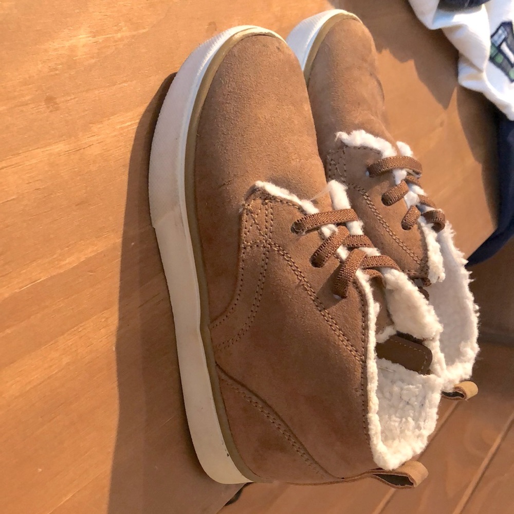 New shoes. Perfect condition. Worn once because my son grew out of them.